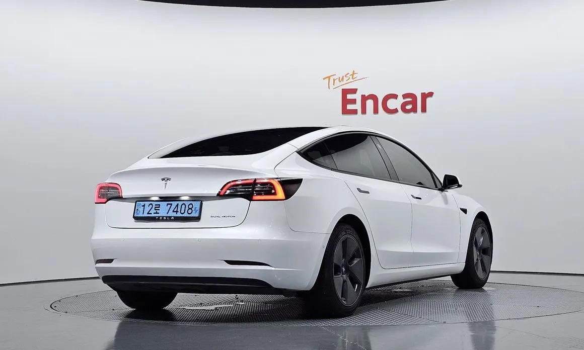 Tesla Model 3 — фото 9