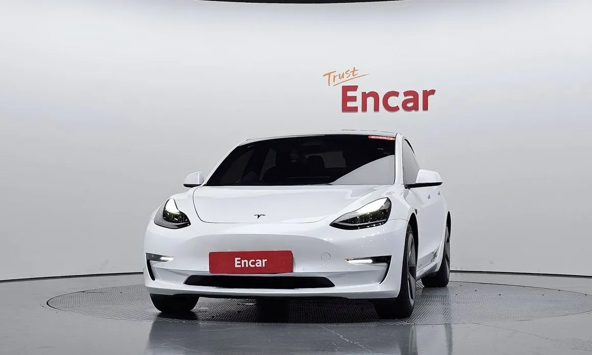 Tesla Model 3 — фото 5
