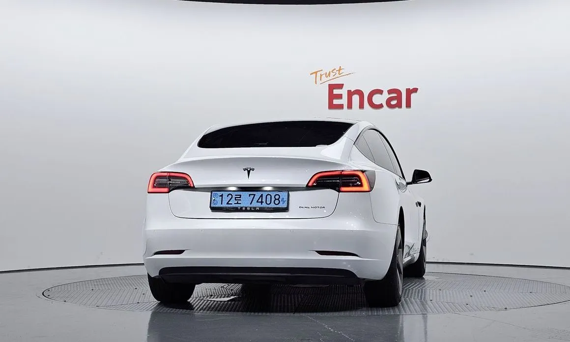 Tesla Model 3 — фото 8