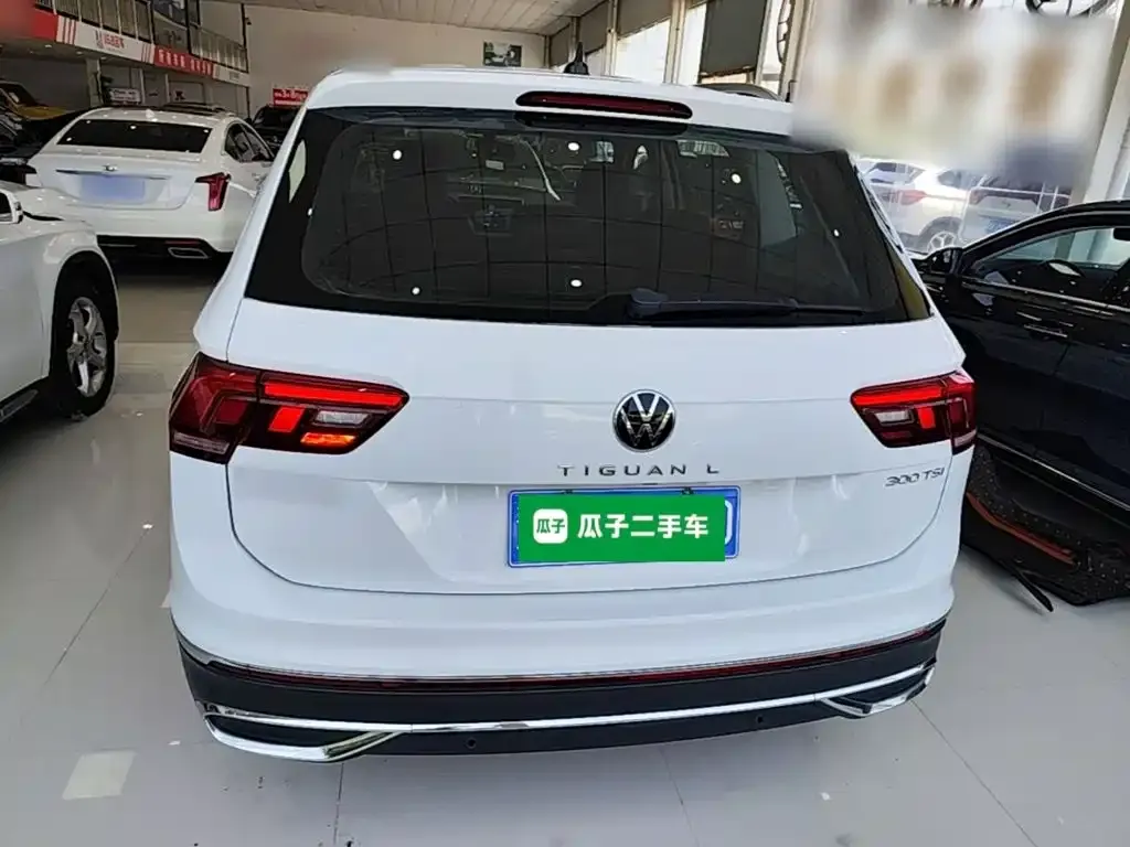 Volkswagen Tiguan L — фото 8