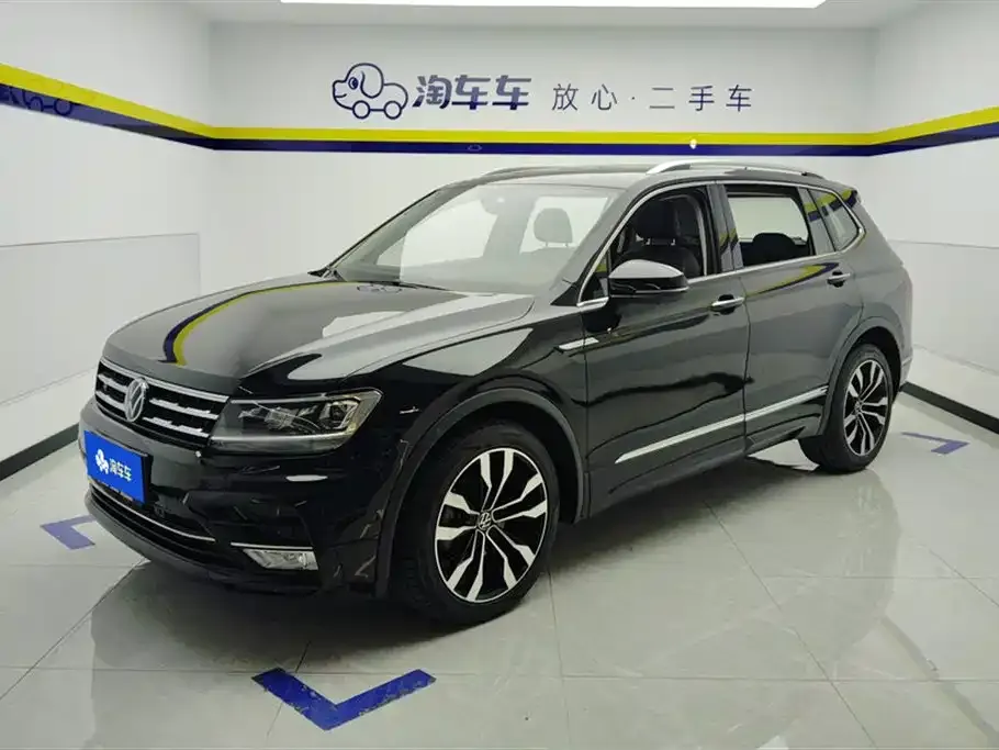 Volkswagen Tiguan L — фото 1