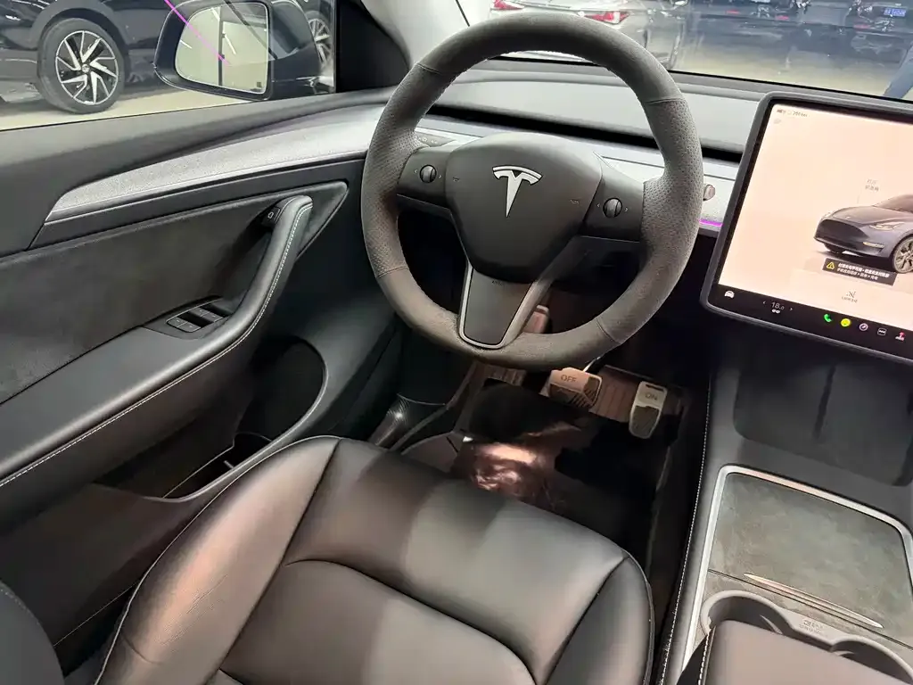 Tesla Model Y — фото 7