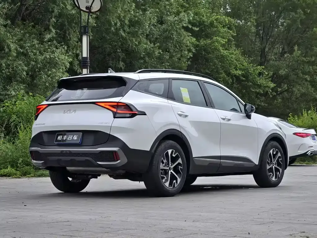 Kia Sportage — фото 8