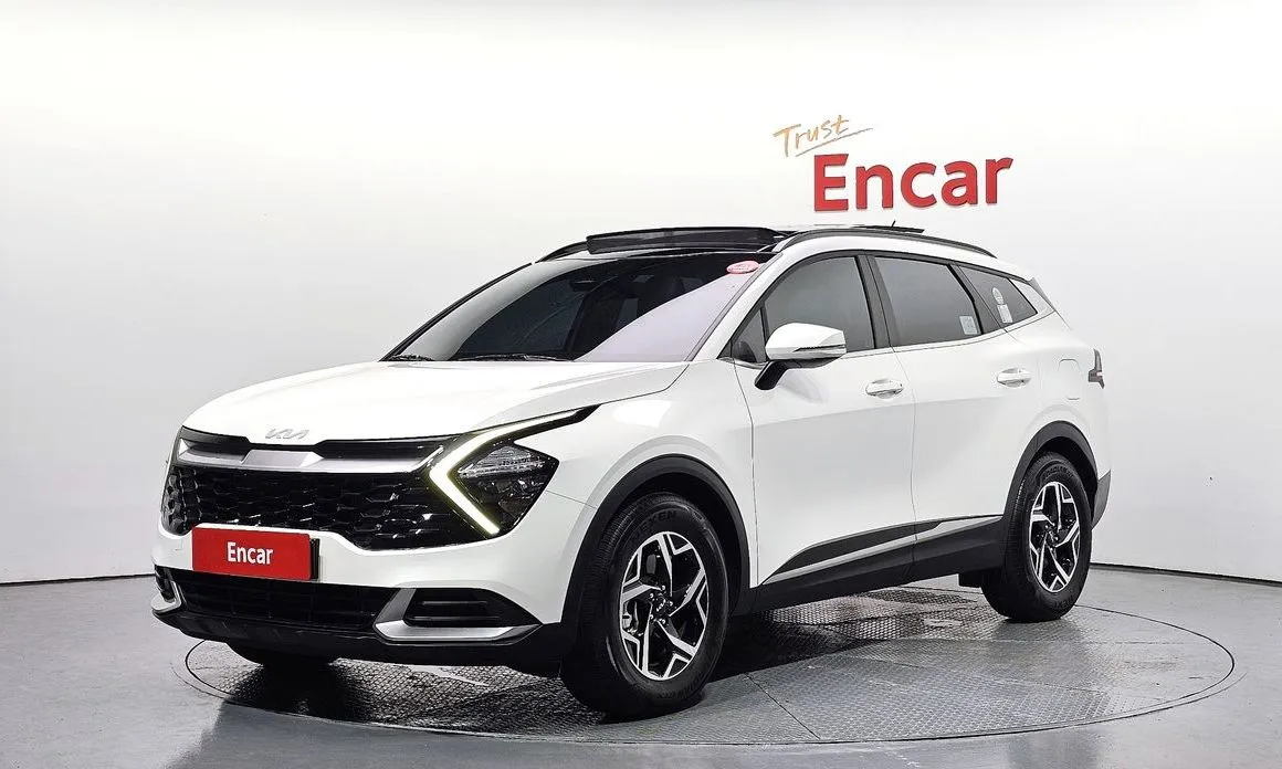 Kia Sportage — фото 1