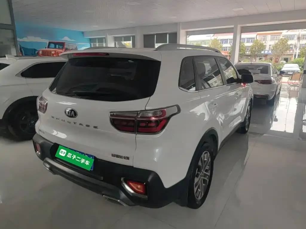Kia Sportage — фото 8