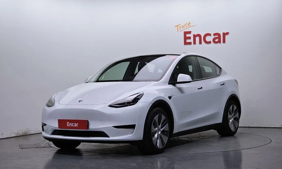 Tesla Model Y — фото 1