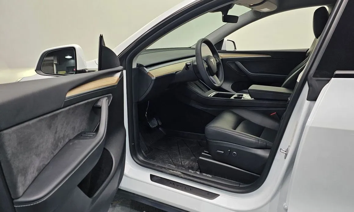 Tesla Model Y — фото 6