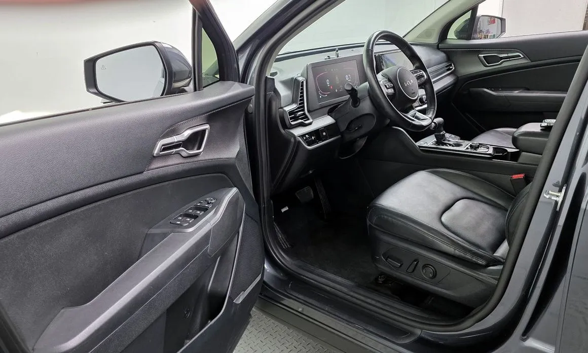 Kia Sportage — фото 10