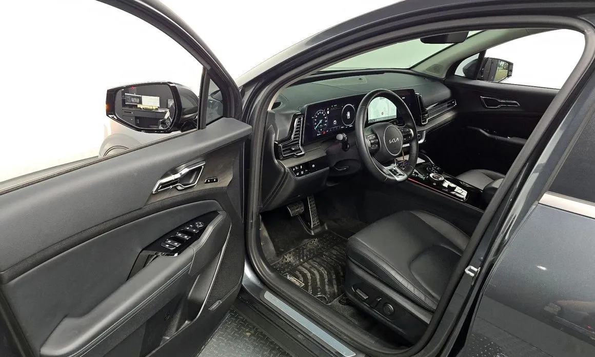 Kia Sportage — фото 7