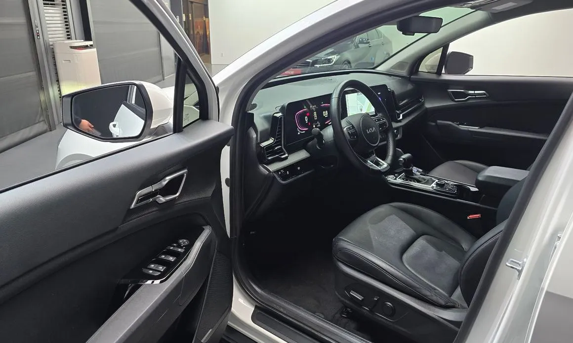 Kia Sportage — фото 6
