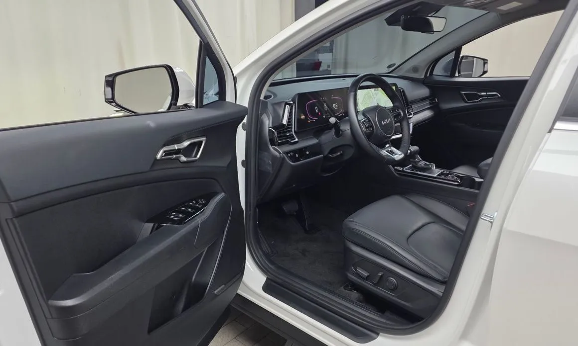 Kia Sportage — фото 10