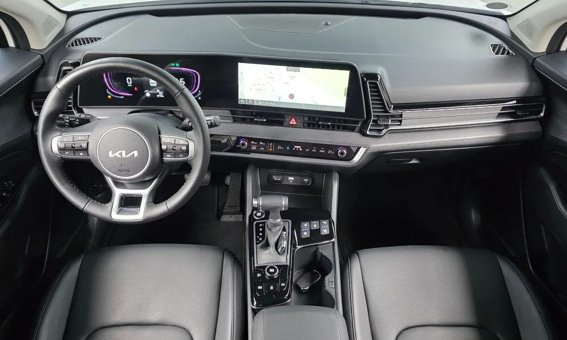 Kia Sportage — фото 8