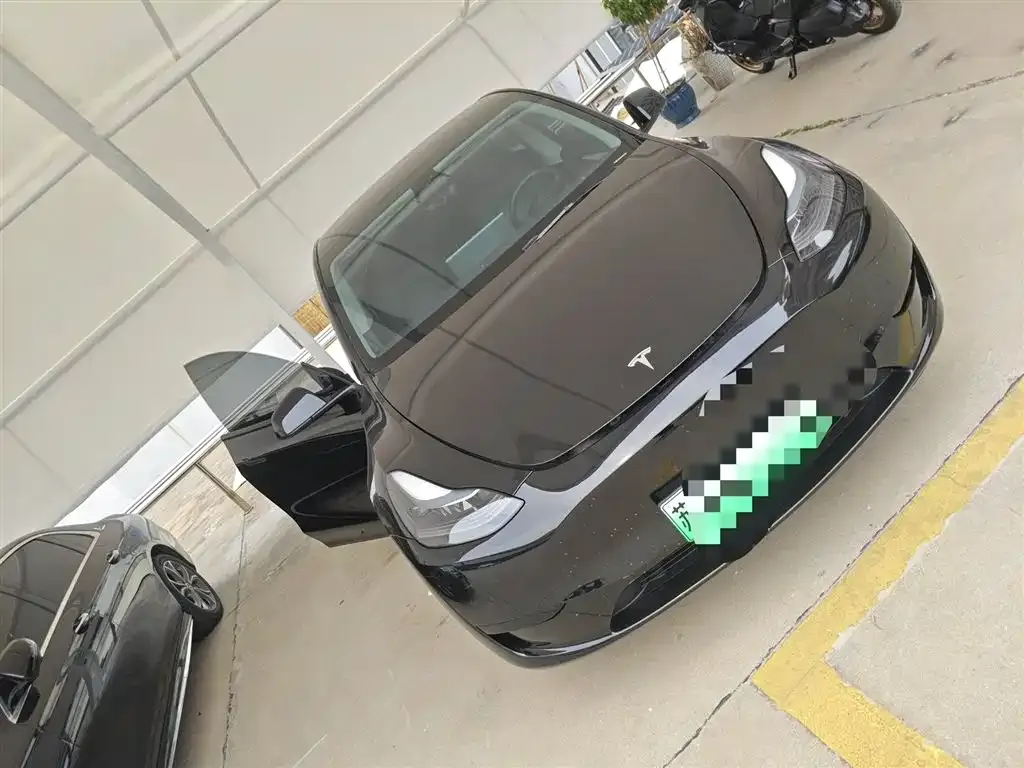 Tesla Model Y — фото 6