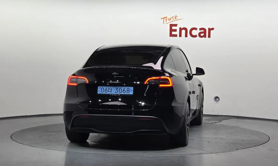 Tesla Model Y — фото 6