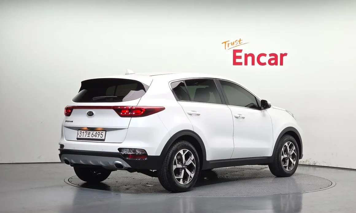 Kia Sportage — фото 7
