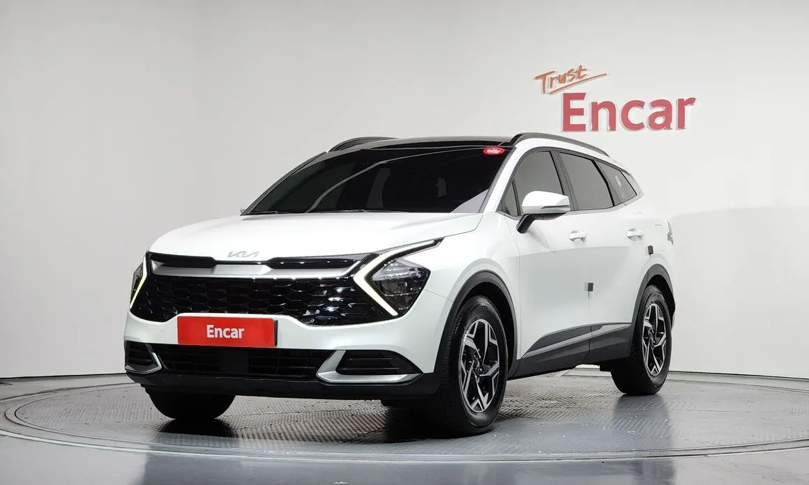 Kia Sportage — фото 1