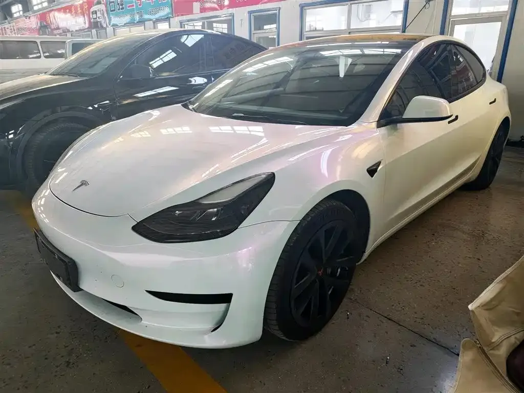 Tesla Model 3 — фото 10