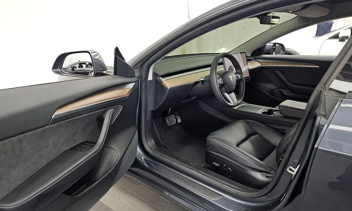 Tesla Model 3 — фото 10