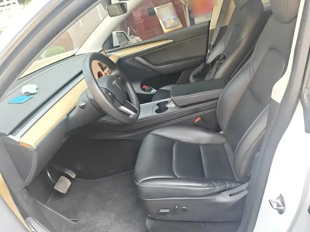 Tesla Model Y — фото 7
