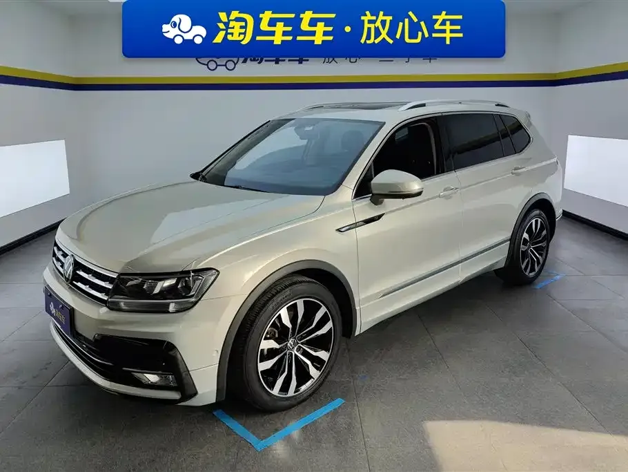 Volkswagen Tiguan L — фото 1