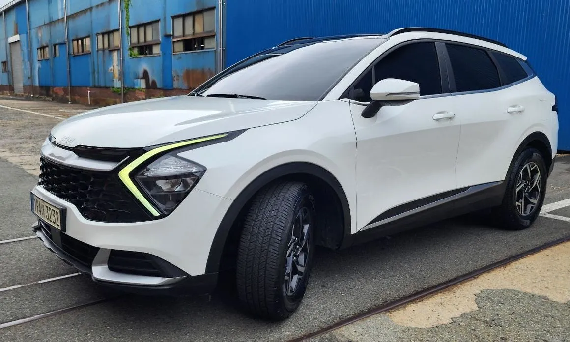 Kia Sportage — фото 1
