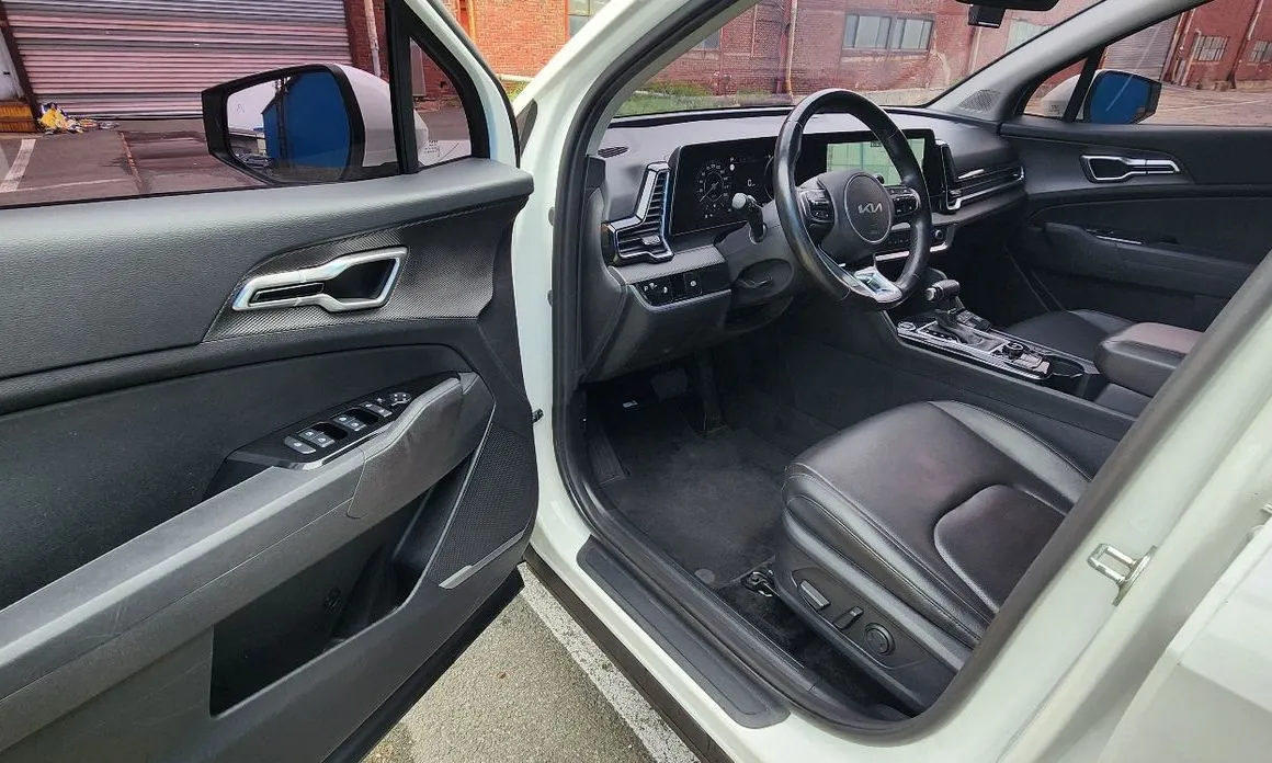 Kia Sportage — фото 6