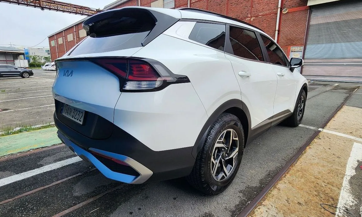 Kia Sportage — фото 10