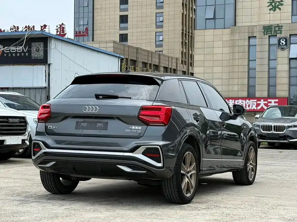 Audi Q2L — фото 10