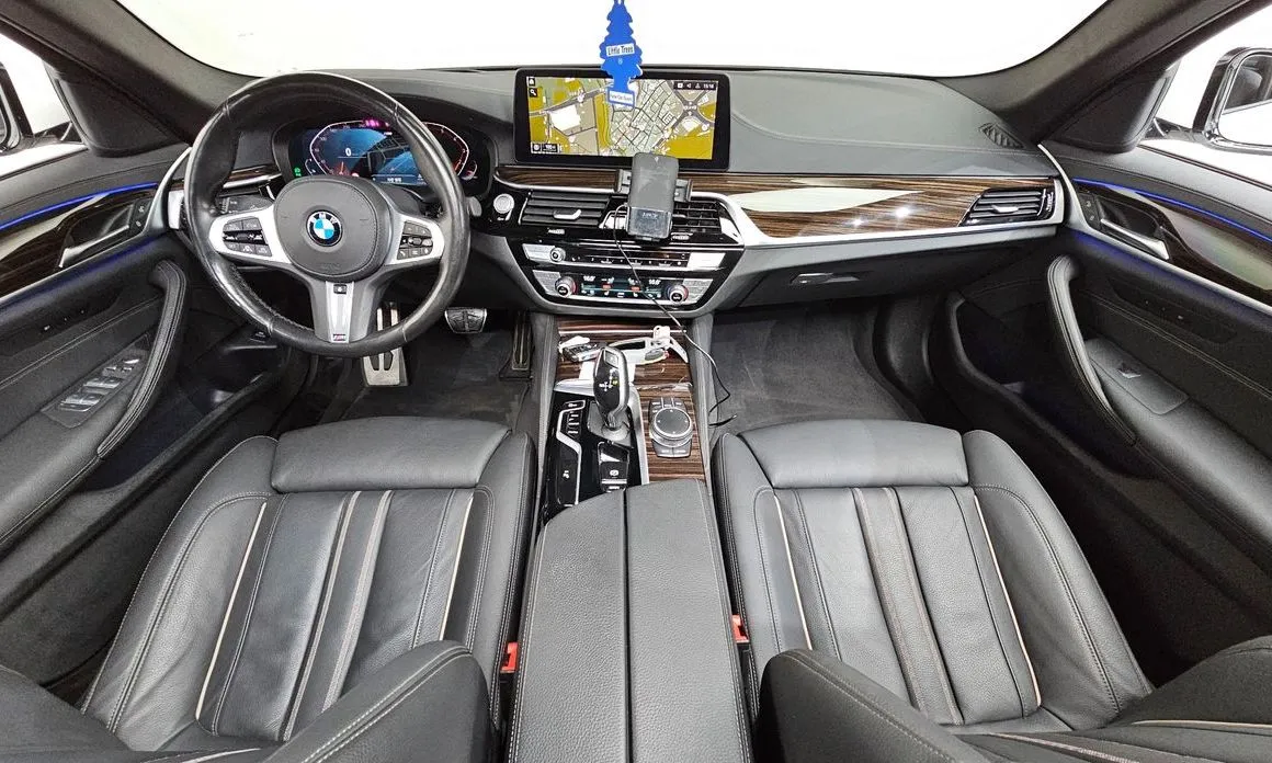 BMW 5-Series — фото 10