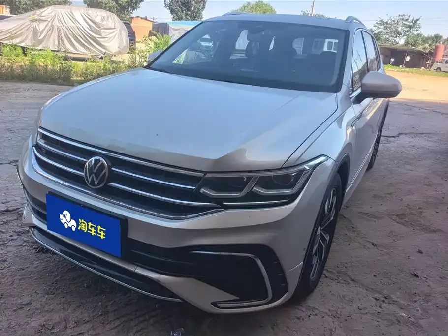 Volkswagen Tiguan L — фото 1