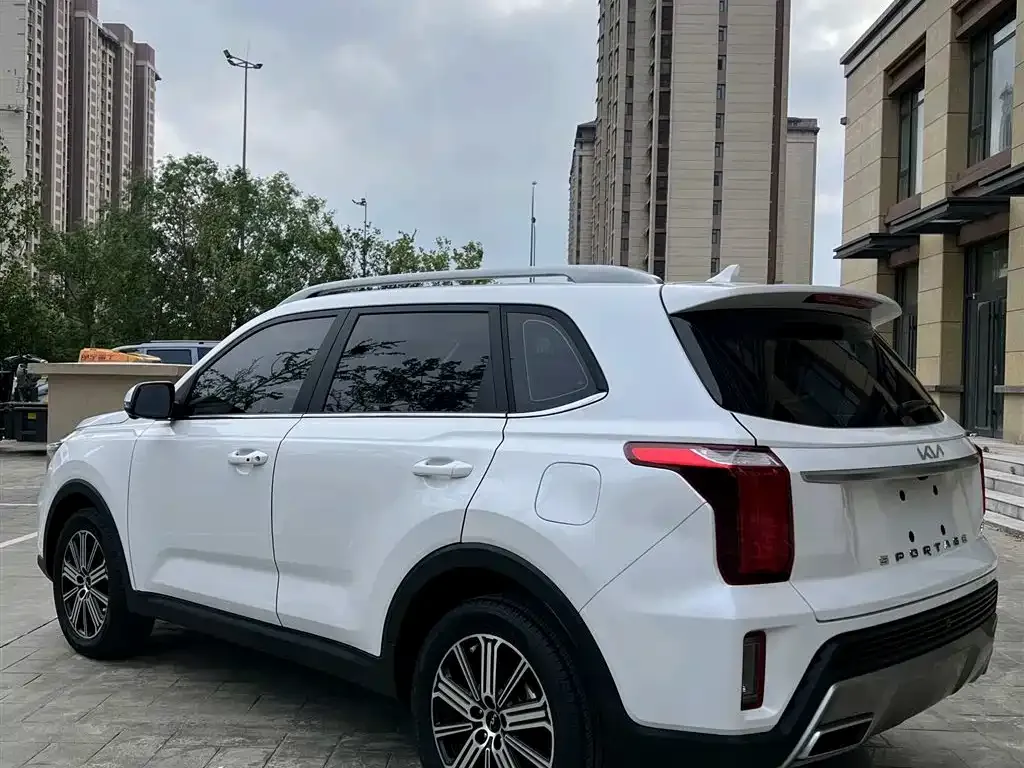 Kia Sportage — фото 10