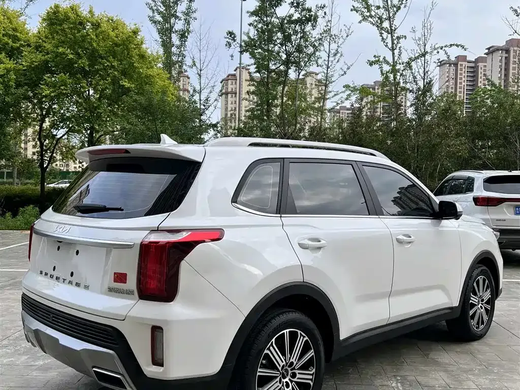Kia Sportage — фото 8