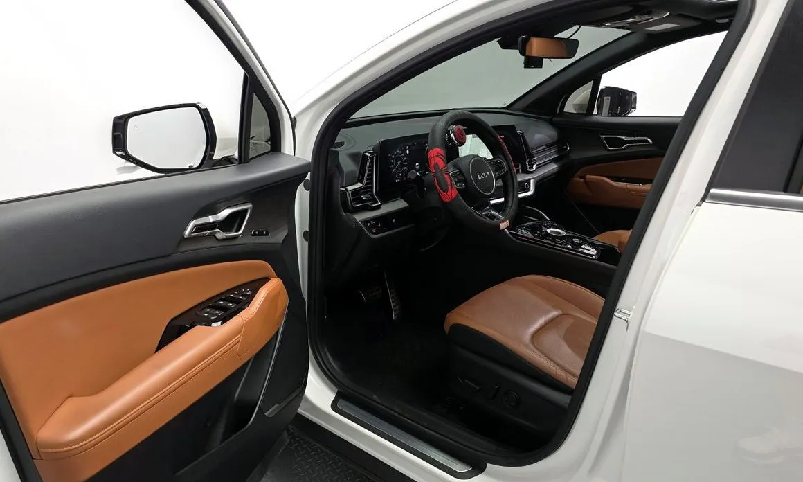 Kia Sportage — фото 6