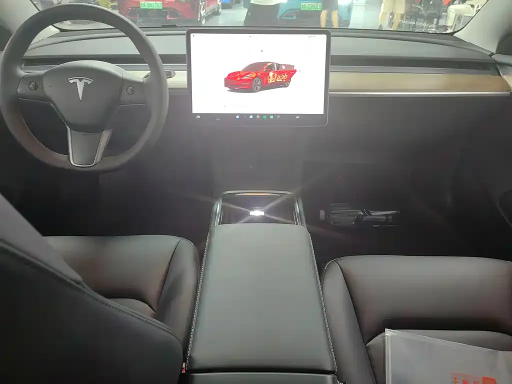 Tesla Model 3 — фото 7