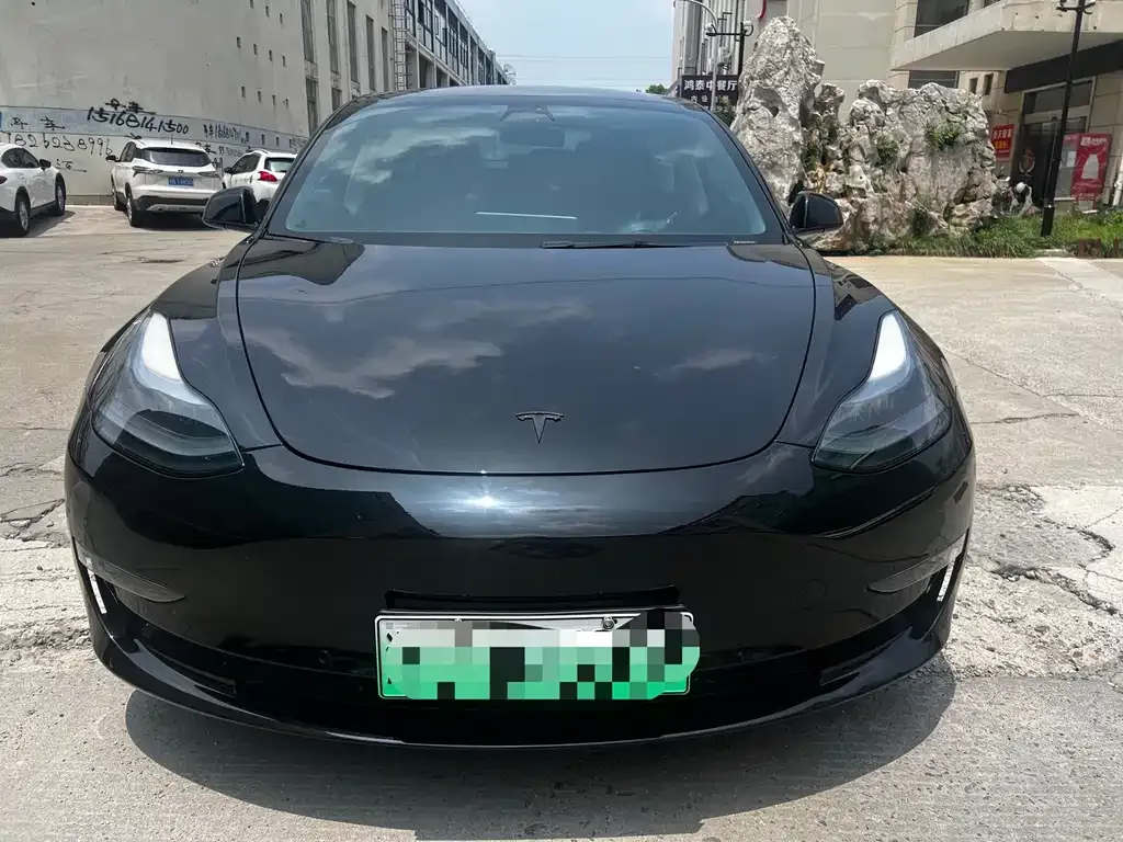 Tesla Model 3 — фото 7