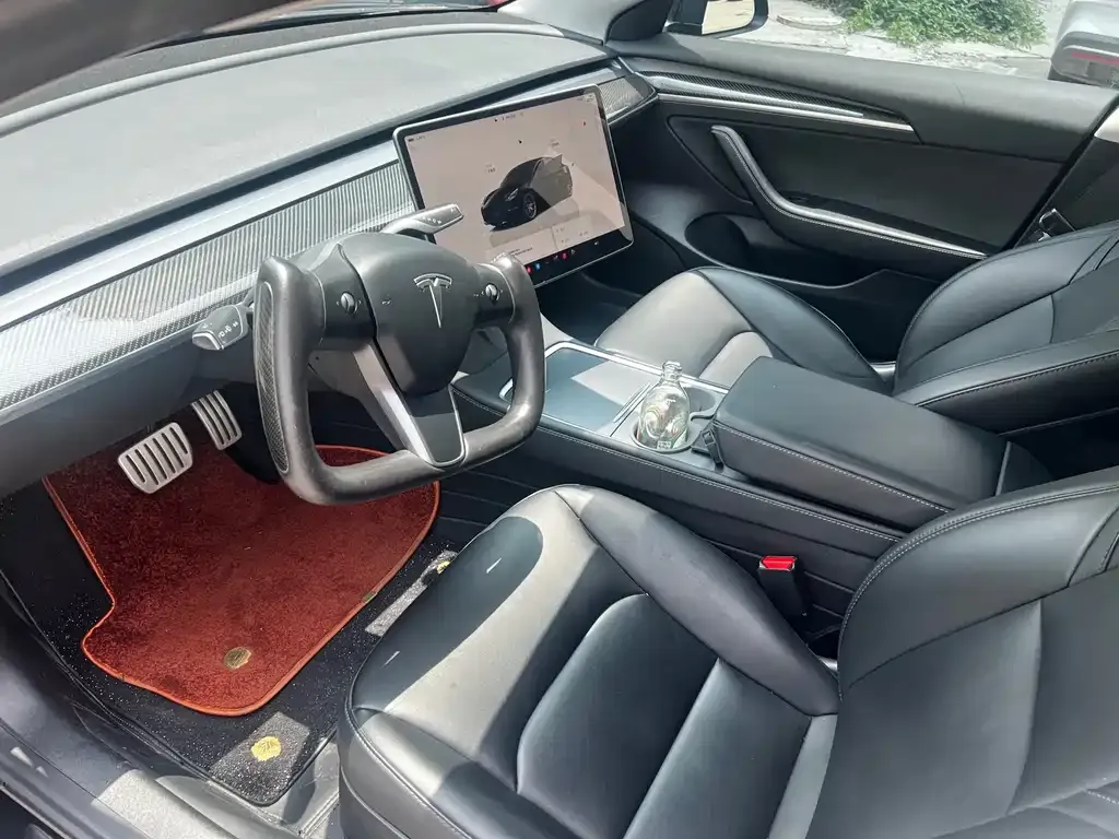 Tesla Model 3 — фото 9