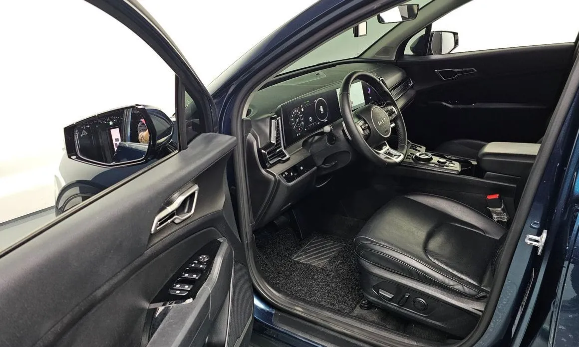 Kia Sportage — фото 10