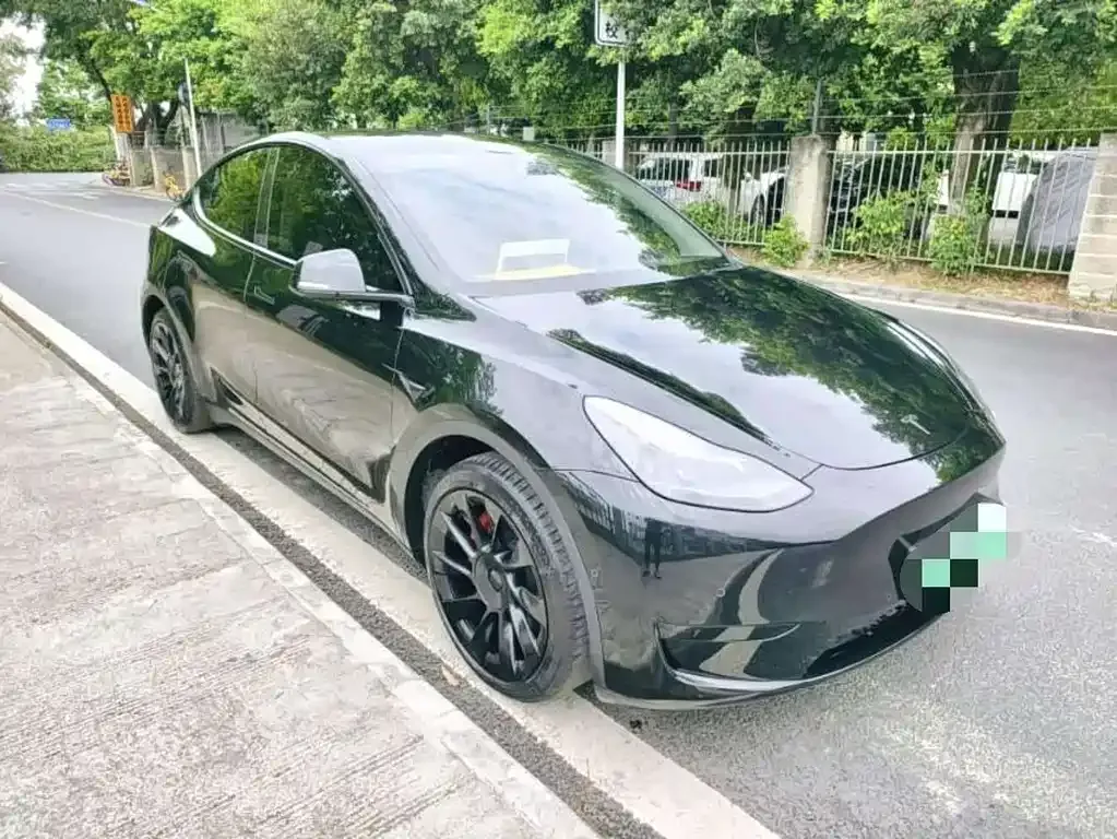 Tesla Model Y — фото 7