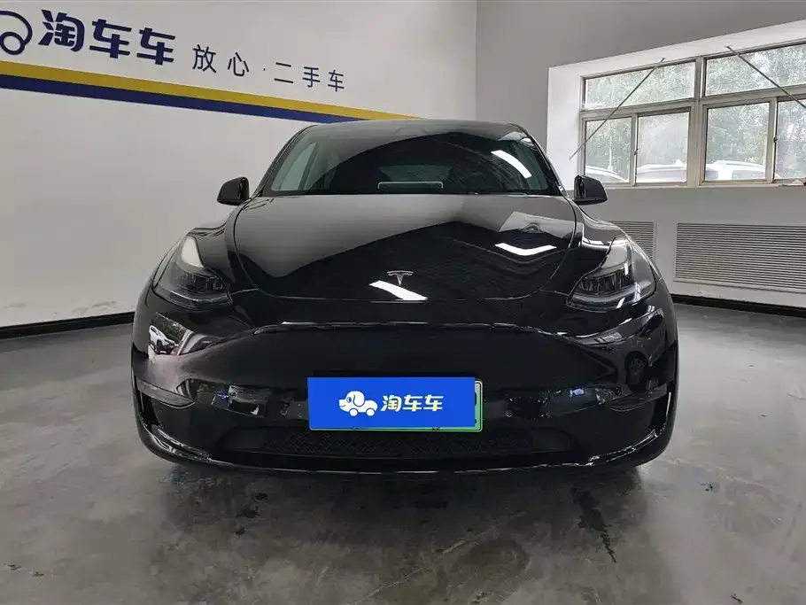 Tesla Model Y — фото 7