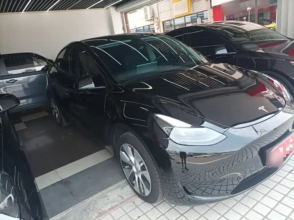 Tesla Model Y — фото 7