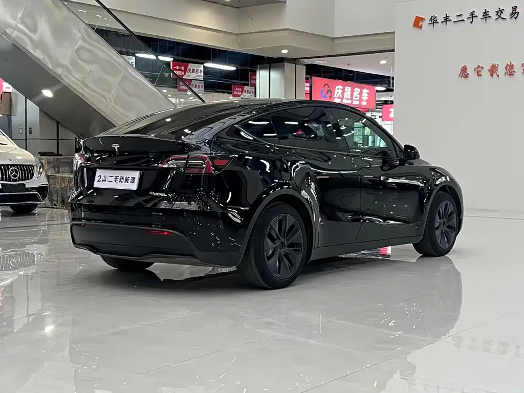 Tesla Model Y — фото 7
