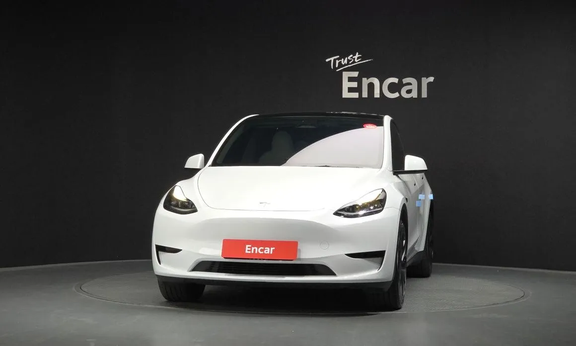 Tesla Model Y — фото 8