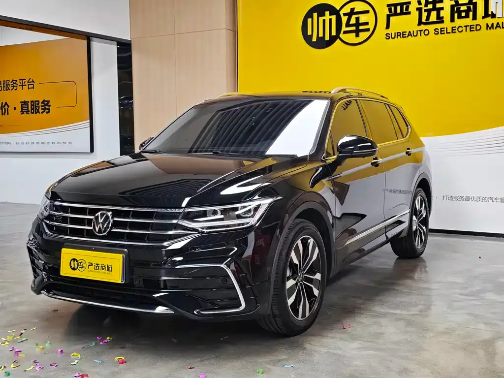 Volkswagen Tiguan L — фото 1