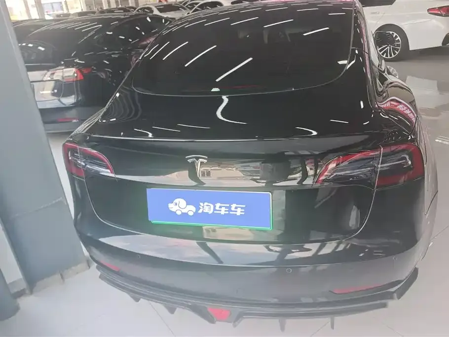 Tesla Model 3 — фото 10