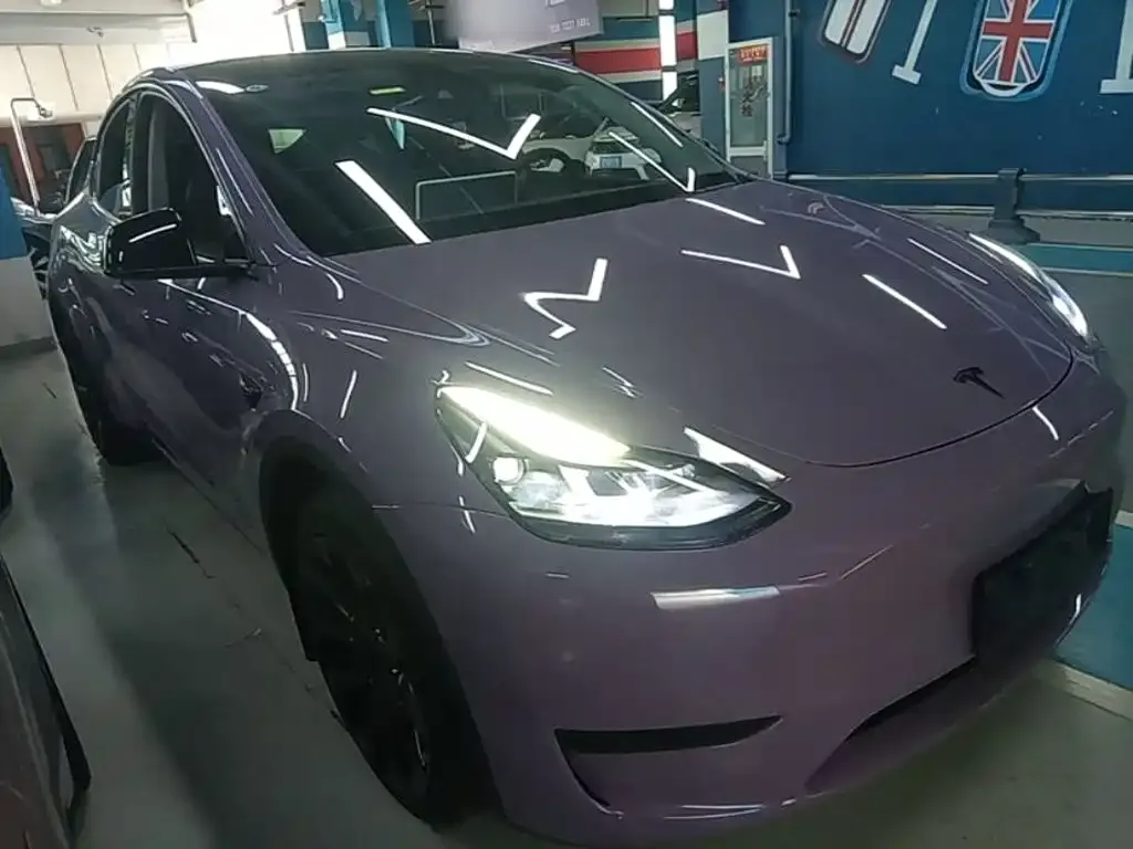 Tesla Model Y — фото 10