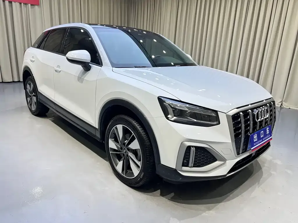 Audi Q2L — фото 10