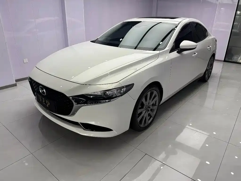 Mazda 3 Axela — фото 1