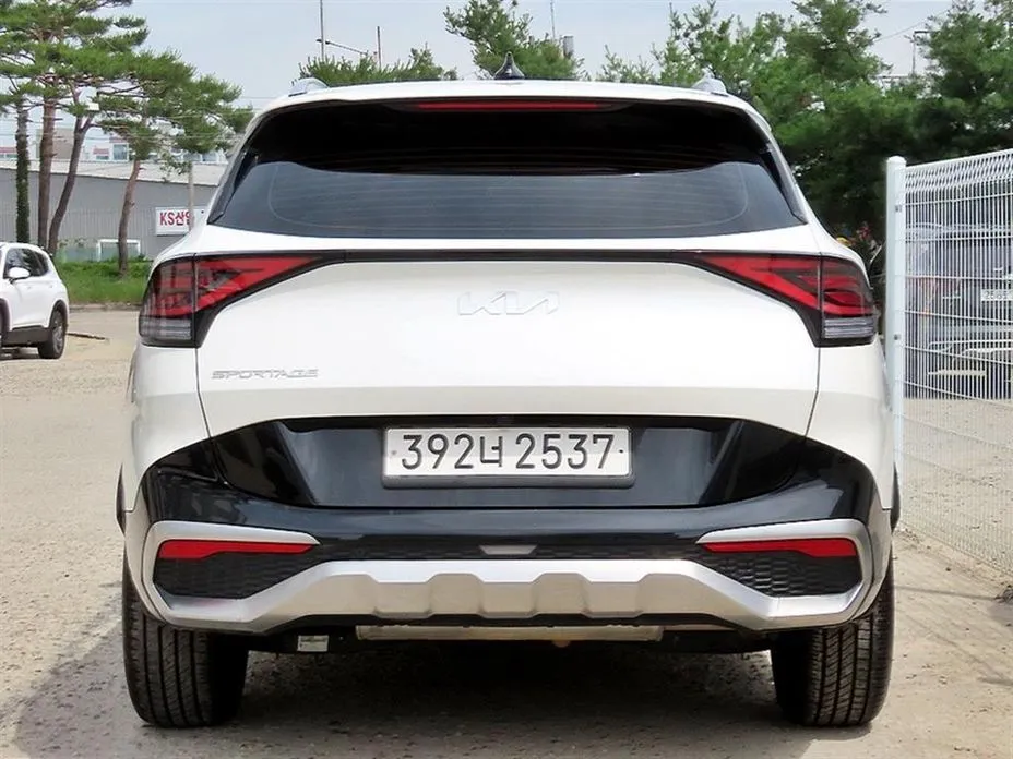 Kia Sportage — фото 7