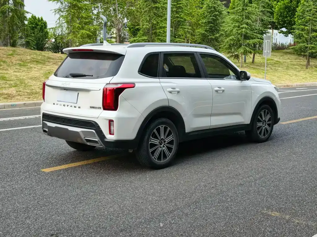 Kia Sportage — фото 10