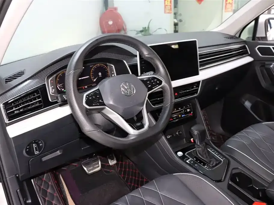 Volkswagen Tiguan L — фото 7